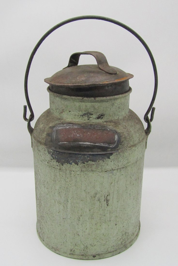early Primitive metal milk can with lid, handle (1 of 2)