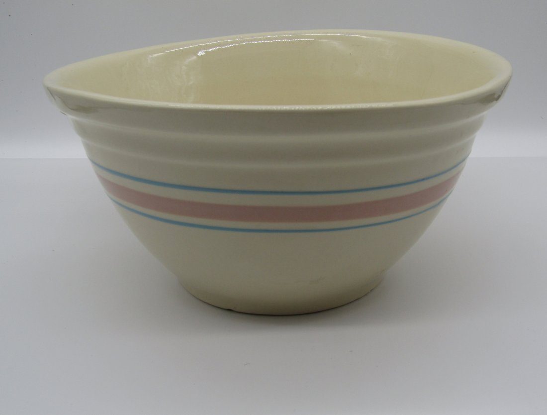 Large Hull Pottery mixing bowl: 12" Hull art pottery mixing bowl with pink and blue bands.