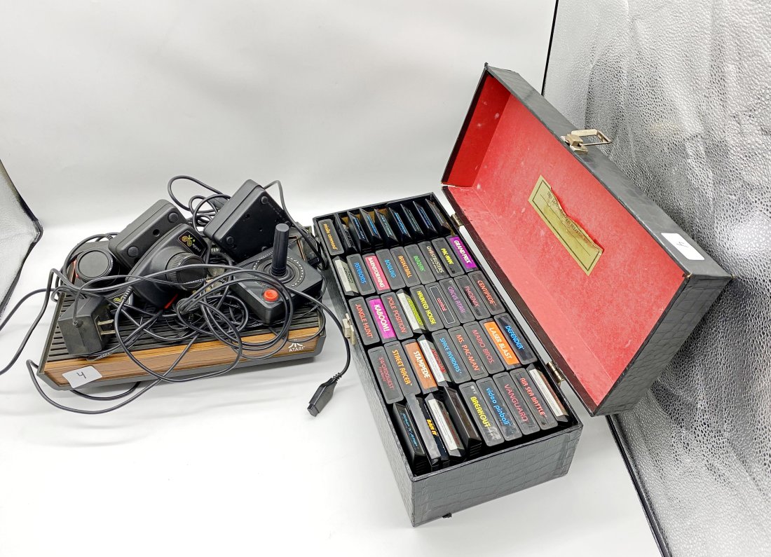 Vintage Artari Console System and Case of Games: Original system with controllers, comes with 46 games