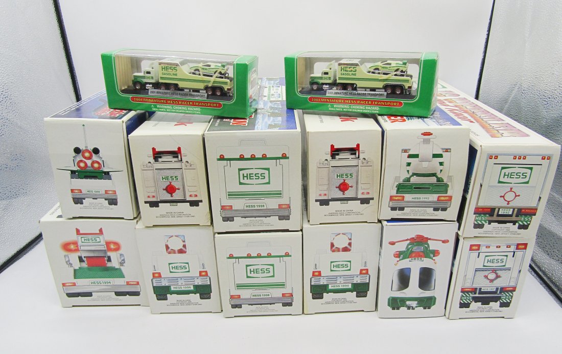 lot of Hess gas station toys in boxes: nice lot of vintage Hess trucks and toys. all but 1998 recreation Van mint in boxes, not played with.