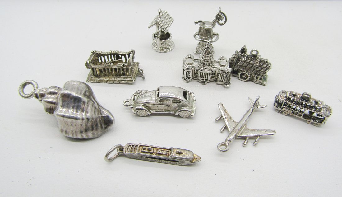 10 vintage sterling charms for charm bracelets: 10 vintage sterling charms to include seashell, car, well, White House, stove, etc.