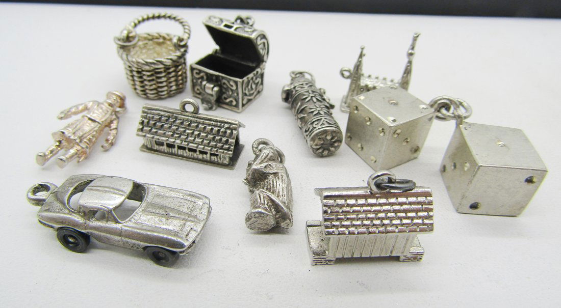 10 vintage sterling charms for charm bracelets: 10 vintage sterling charms to include dice, treasure chest, car, buildings, etc.
