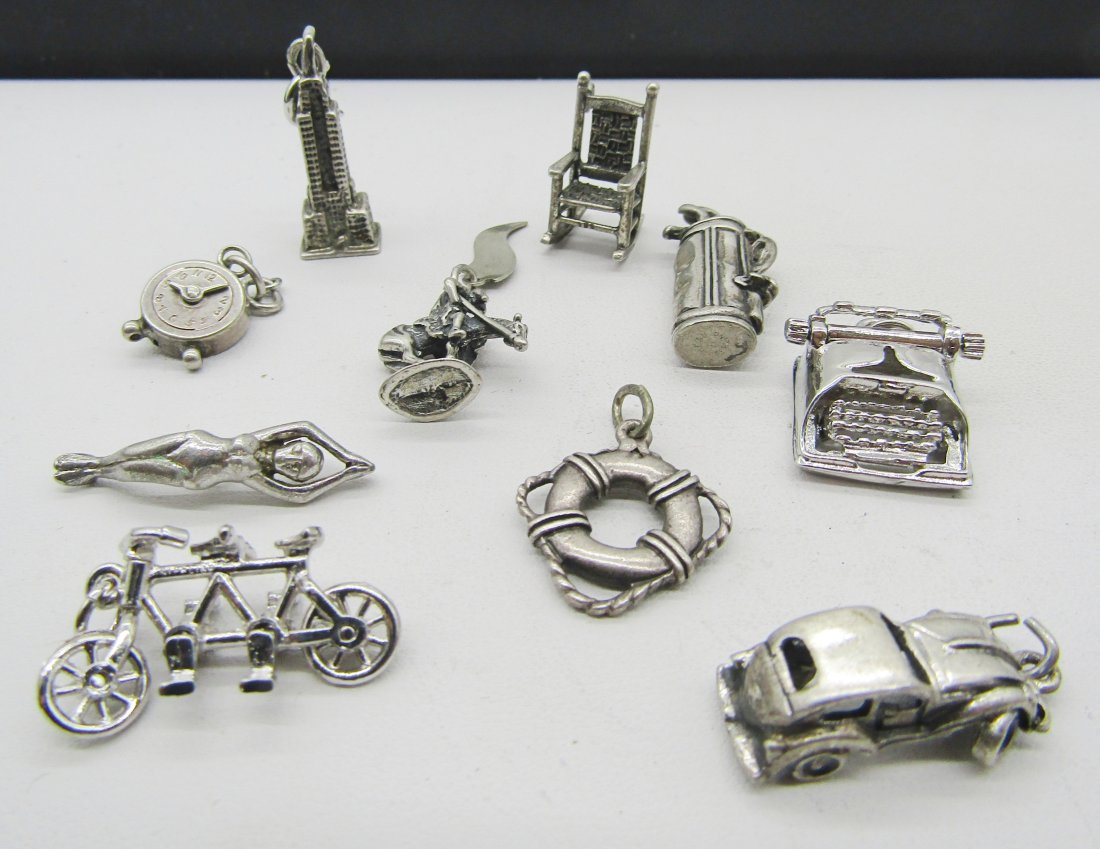 10 vintage sterling charms for charm bracelets: 10 vintage sterling charms to include gold bag, typewriter, car, bike, etc.