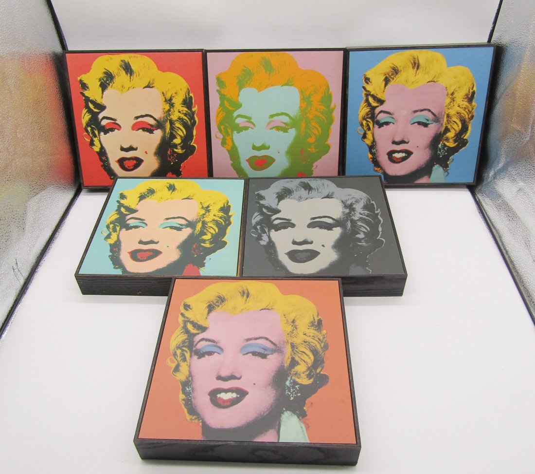 6 Andy Warhol, Marilyn Monroe prints on board, framed: 6 Andy Warhol, Marilyn Monroe prints on board in different colors. all have wood frames., hand stained. Made in Canada. ready to hang.