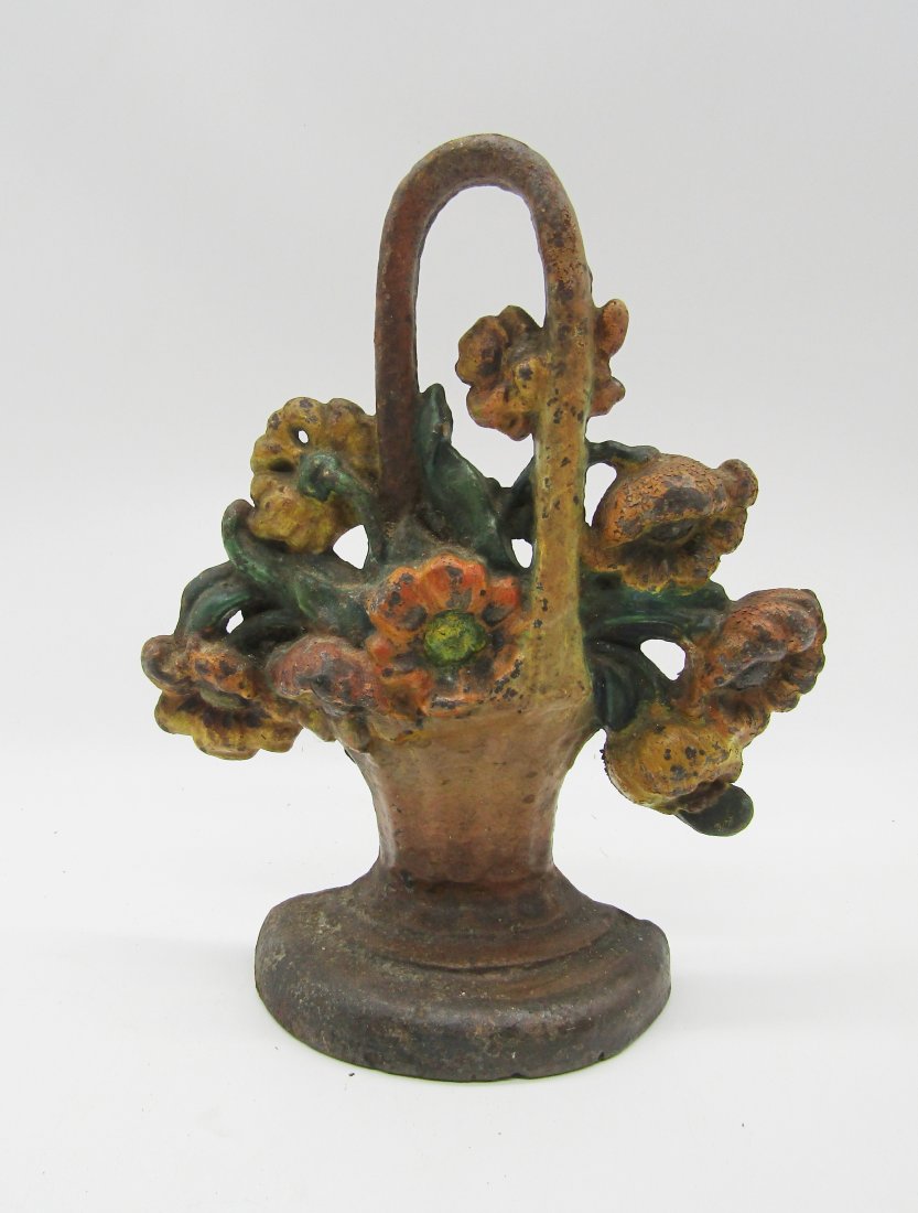 antique cast iron doorstop basket of flowers: stands 8+1/2" high. most likely Hubleyver