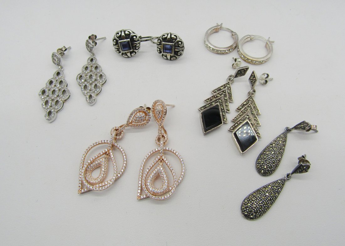 6 pair of Fashion and vintage sterling earrings: estate lot of sterling earrings to include crystal, onyx, Marcasite. 38 grams TW.
