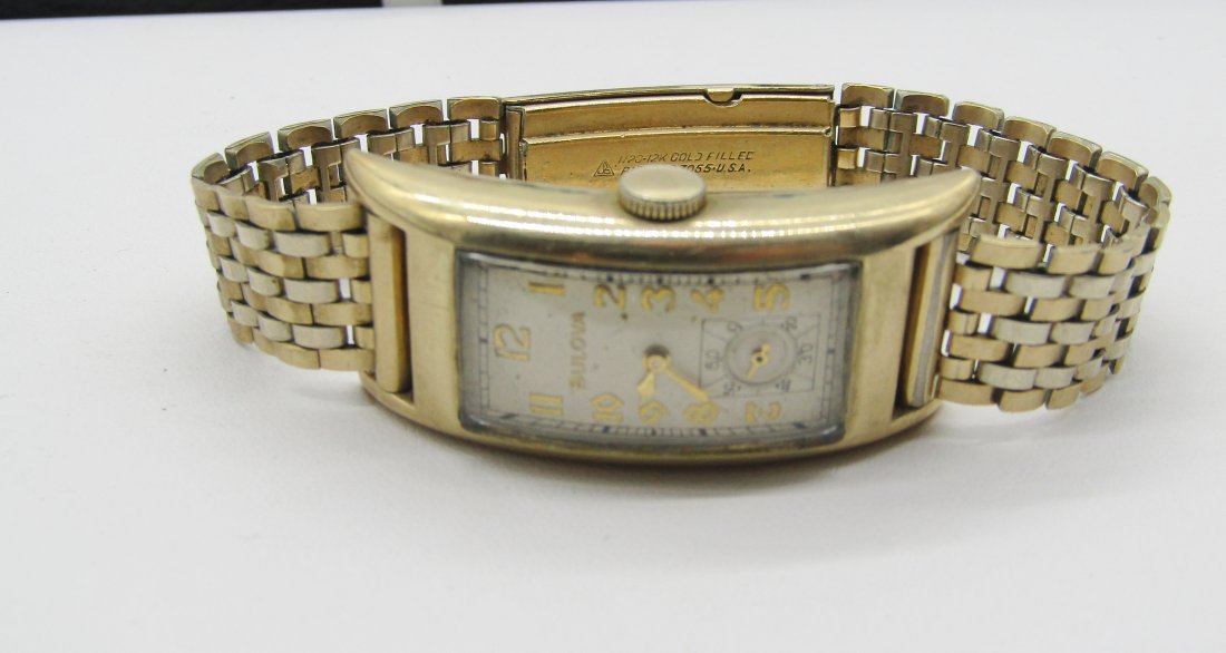 vintage Bulova Curvex watch: vintage Bulova watch in gold filled curvex case.