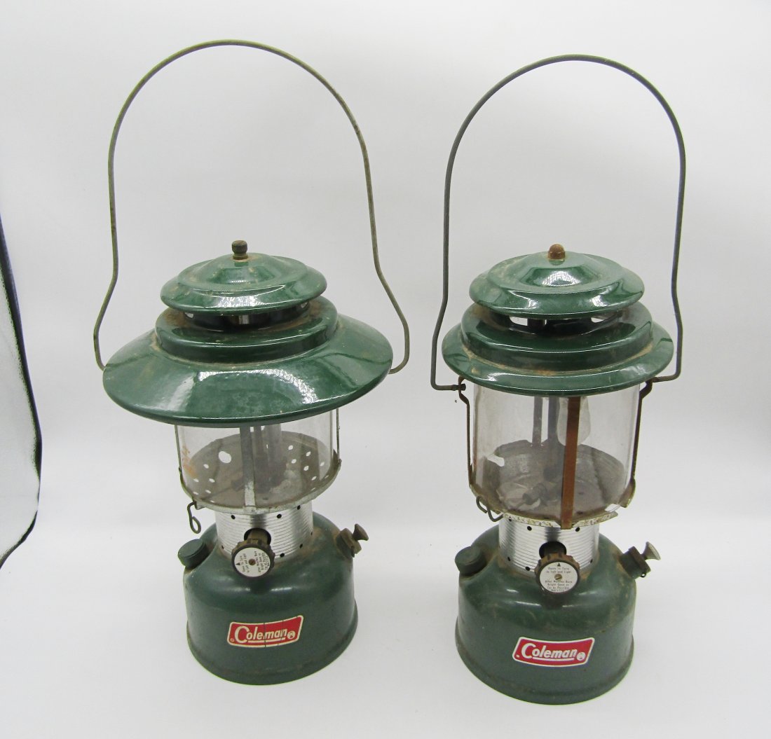 2 vintage Coleman camping lanterns: 2 vintage Colman Camping Lanterns. both stand 12" high. 1 with hood.