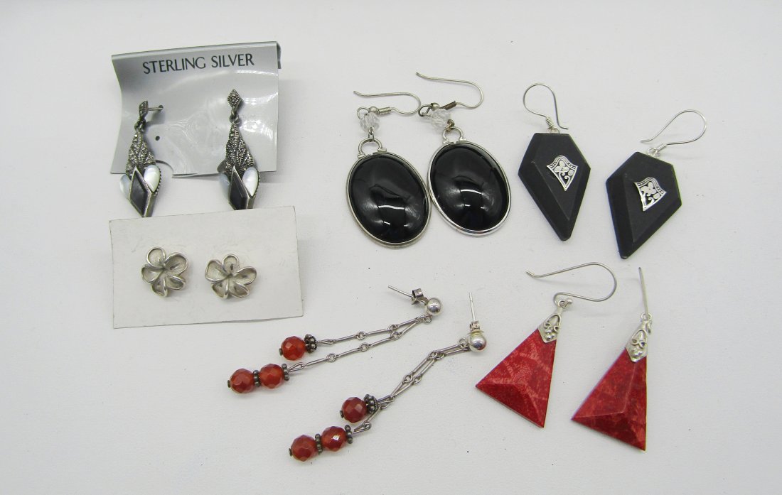 6 pair of sterling earrings: nice estate lot of sterling earrings. 5 dangle, 1 stud. resin, Marcasite, MOP, etc.