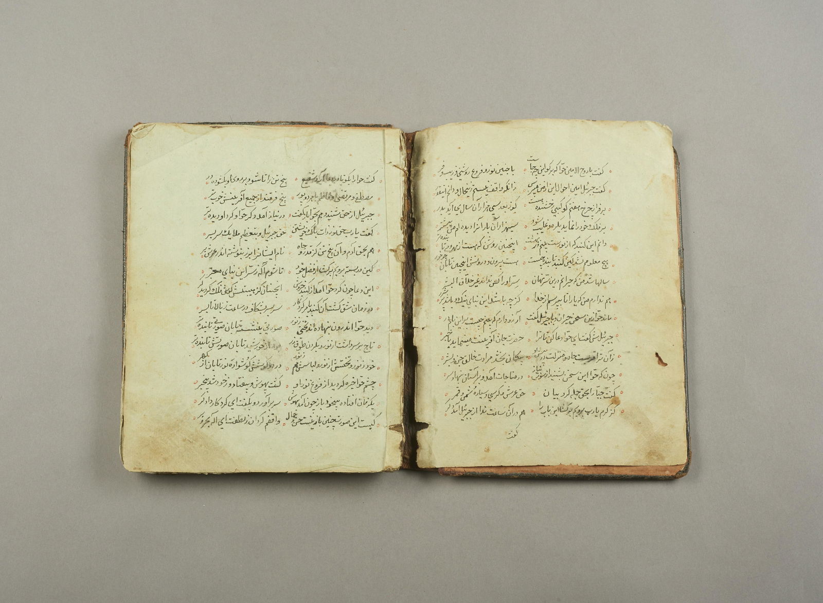 Shiite manuscript in praise of Ali, commander of the devotees Central Asia, early 19th century: Poetic text on light blue vellum paper reading a qasida extolling the deeds of Ali.Composed of 46 papers, incomplete, Persian text in Central Asian provincial nastaliq in black and red ink on a single
