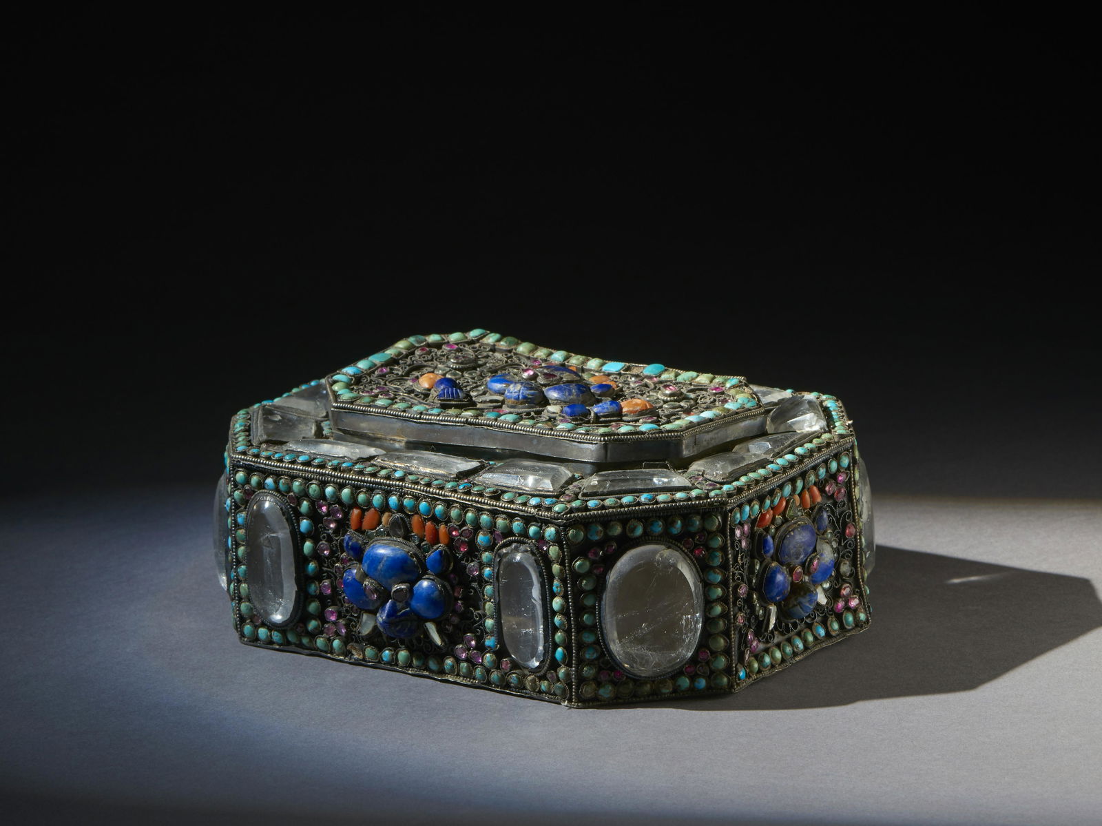 Encrusted silver box  Tibet, 19th century  Measurements: h. 7 X w. 17 X d. 12 cm (1 of 4)
