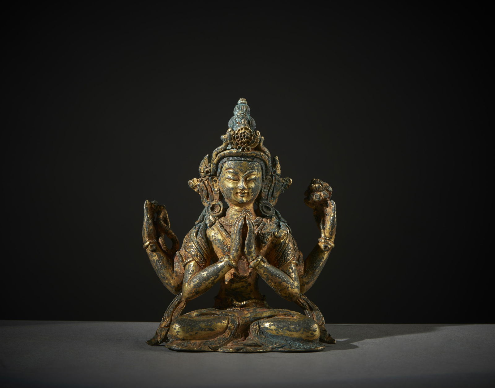 A gilt bronze Avalokitesvara figure Tibet, 19th century  Measure: h. 10 X l. 8 cm (1 of 4)