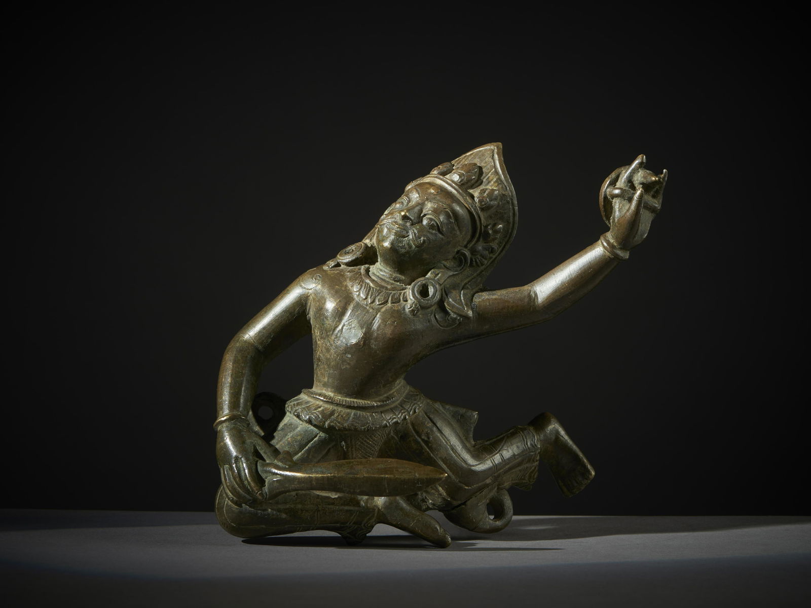 A bronze figure of a warrior Nepal, inizio 19th century  Measure: h. 19,5 X l. 15 cm (1 of 5)