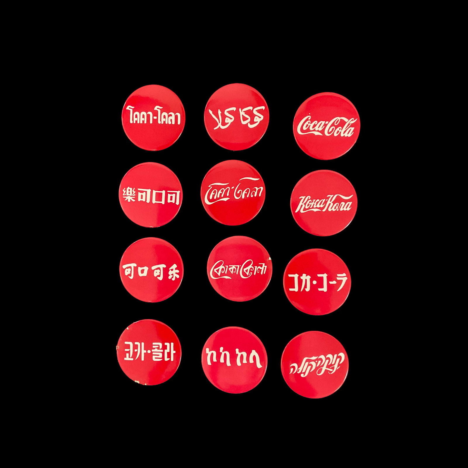 Set of 12 Coca-Cola in Foreign Languages Metal Buttons U.S.A. #1-12 (1 of 2)