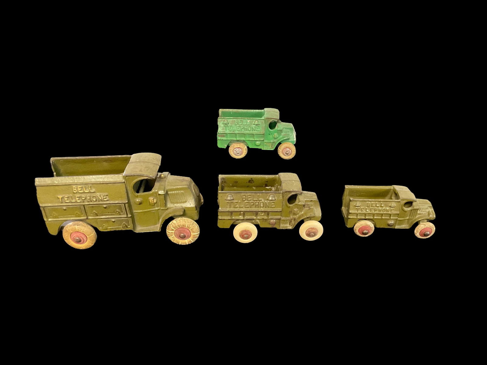 Grouping of 4 Cast Iron Bell Telephone Toy Trucks (1 of 11)