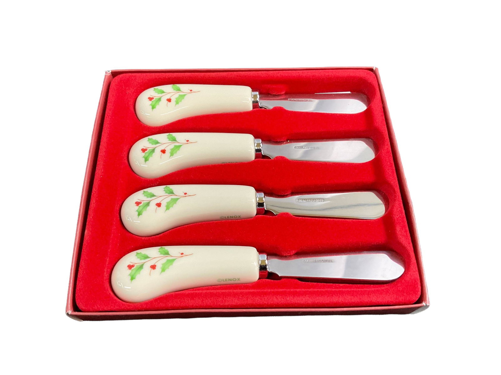 Lenox Holiday Holly Berries Knife Spreaders Set of 4 with box: Lenox Holiday Holly Berries Knife Spreaders Set of 4 with box, Each spreader measures 5 1/2" L, Includes original box with plastic cover, Condition very good, see photographs