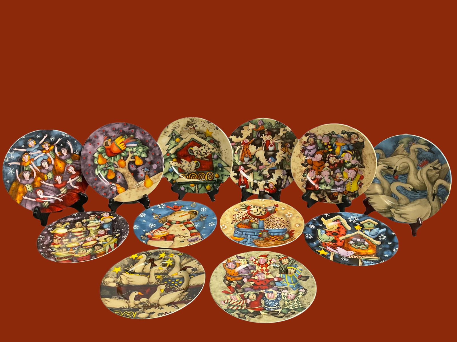 Twelve Days of Christmas Dessert Plates by Debi Hron with box: Twelve Days of Christmas Dessert Plates by Debi Hron with box, Collection for Gibson, Plates measure 8" diameter, Condition very good, see photographs