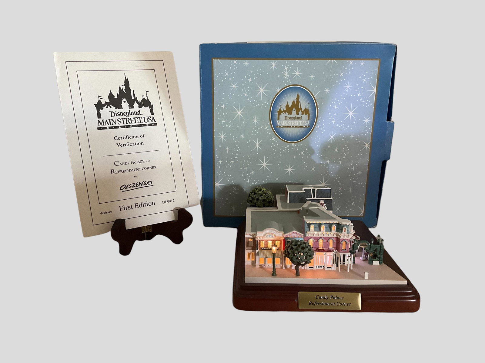 Disneyland Main Street USA Collection Candy Palace and Refreshment Corner First Edition COA: Disneyland Main Street USA Collection Candy Palace and Refreshment Corner First Edition, by Robert Olszewski Master Artist, Measures 7" L x 6 1/2" W x 2 3/4" H, Condition very good, see photographs, m
