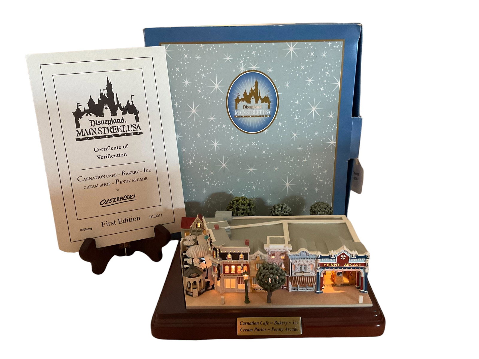 Disneyland Main Street USA Collection Carnation CafÃ© Bakery Ice Cream Shop Penny Arcade First: Disneyland Main Street USA Collection Carnation CafÃ© Bakery Ice Cream Shop Penny Arcade First Edition with COA and Box, by Robert Olszewski Master Artist, Measures 7 3/4" L x 7" W x 3" H, Condition