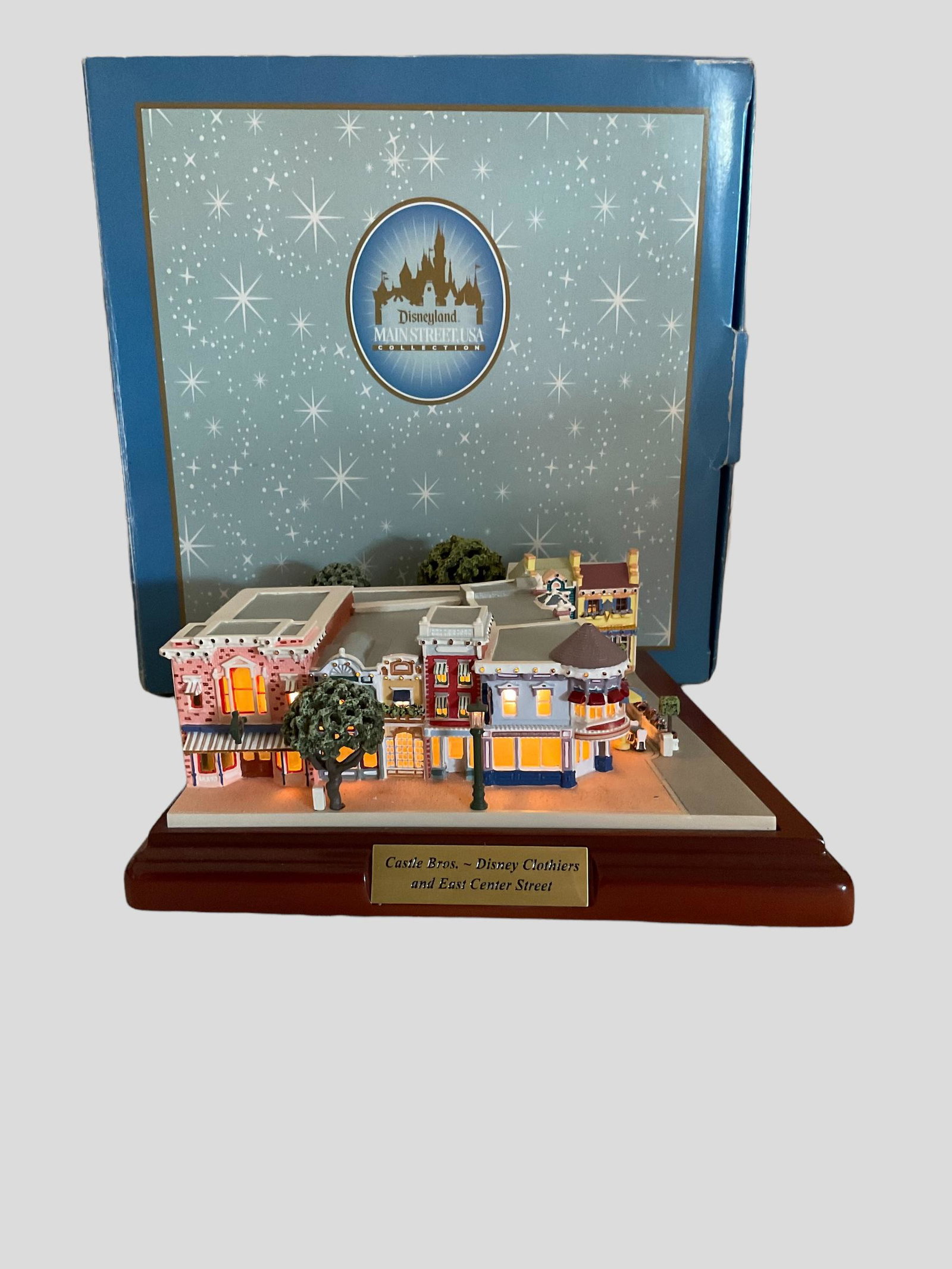 Disneyland Main Street USA Collection Castle Bros. Disney Clothiers East Central Street First: Disneyland Main Street USA Collection Castle Bros. Disney Clothiers East Central Street First Edition with Box, NOTE NO COA, by Robert Olszewski Master Artist, Measures 7" L x 7" W x 3" H, Condition v