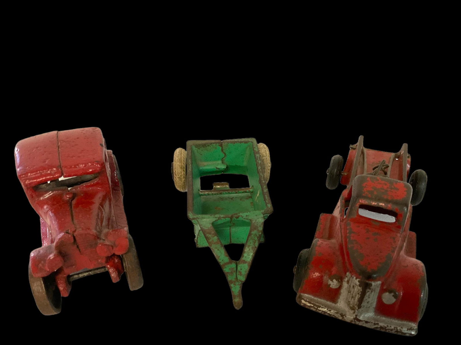 3 Arcade Cast Iron Toys: 3 Arcade Cast Iron Toys, Cast Iron 3900 toy Wrecker Tow Truck with Label 6" L, Cast Iron Model A Red Ford Coupe 5" L, Cast Iron Manure Spreader 5 1/2" L, Condition wear appropriate with age, wear and