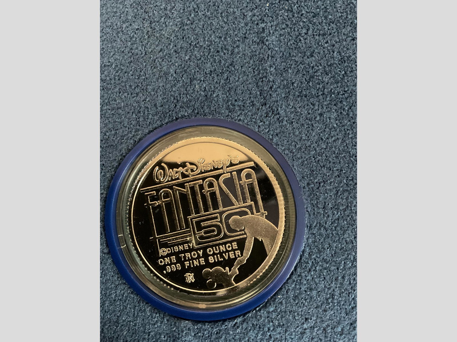 Walt Disney Fantasia 50th Anniversary One Troy Ounce .999 Fine Silver Coin in Display Case: Walt Disney Fantasia 50th Anniversary One Troy Ounce .999 Fine Silver Coin in Display Case, Condition very good, see photographs