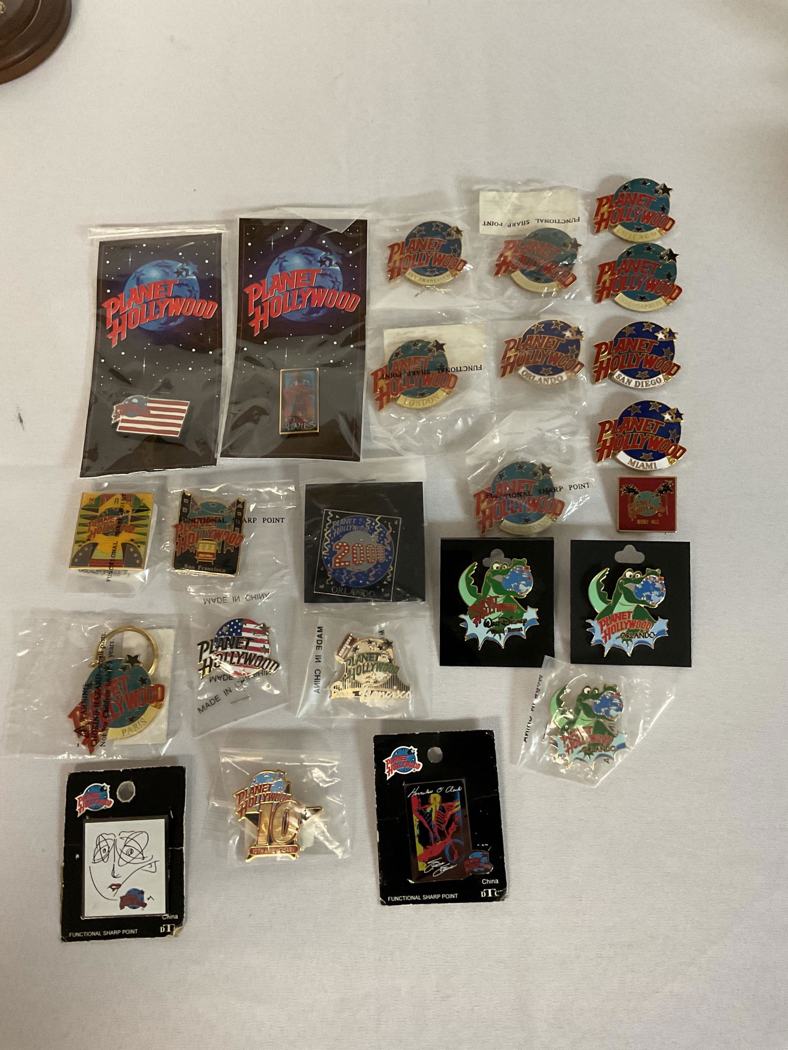Collection of 23 Planet Hollywood Pins Plus Key Chain (1 of 6)