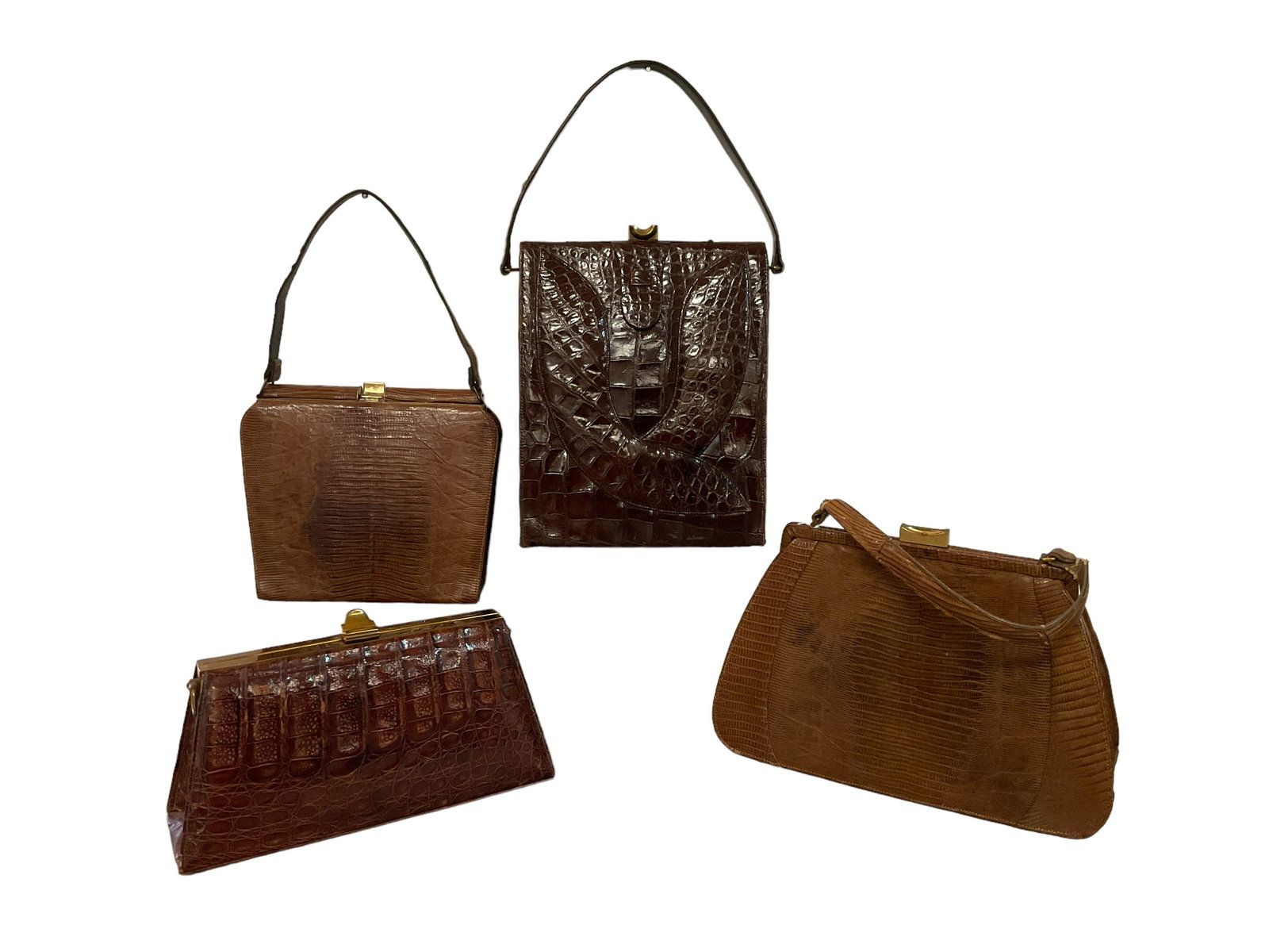 4 Alligator, Lizard Purses: 4 Alligator, Lizard Purses, 1 Lizard purse with coin purse, 1 alligator purse by Koro Creation with mirror, piece torn on top of purse, 1 alligator clutch, has broken strap, 1 alligator purse by Paliz