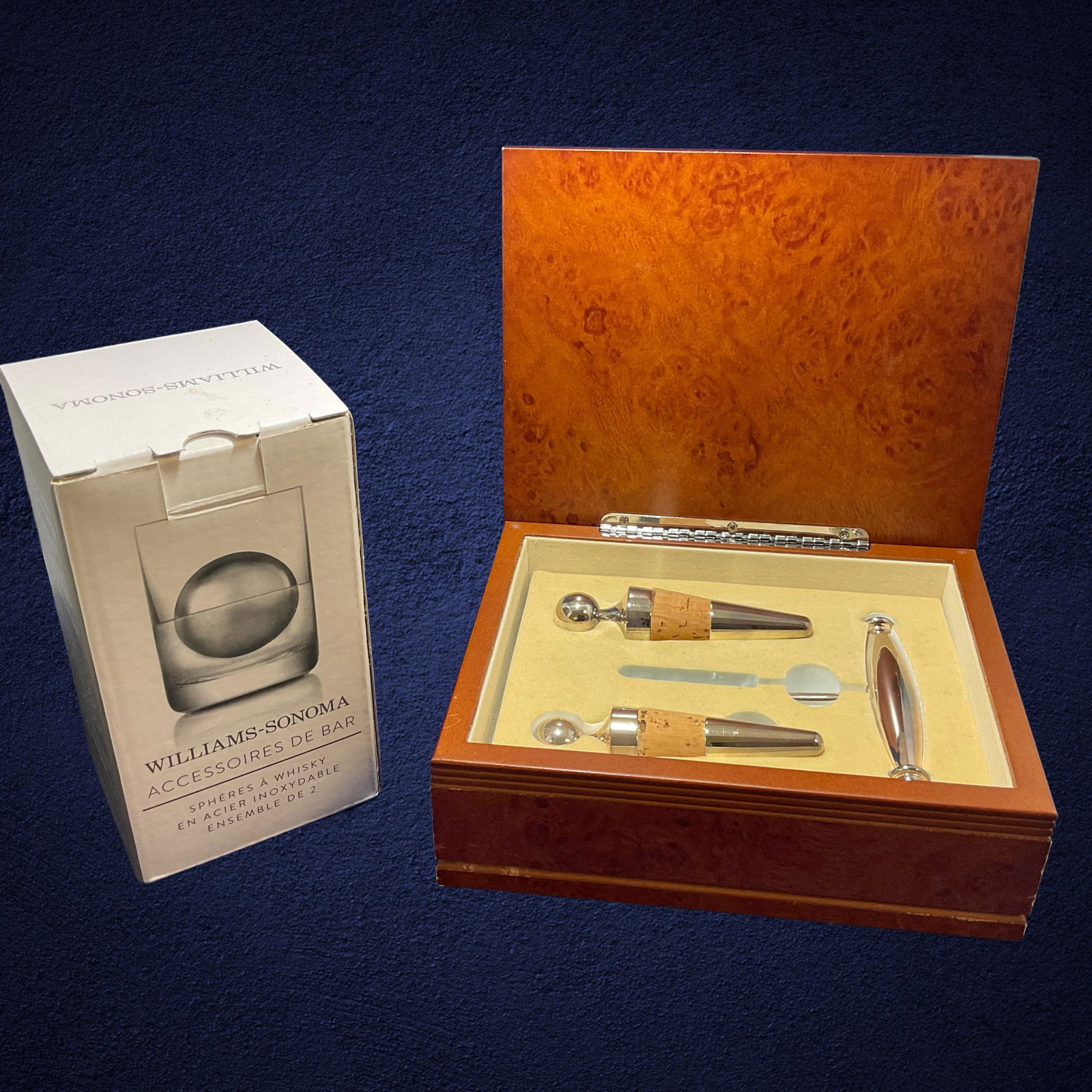 Vintage Wine Tools in Burled Wood Box and Whiskey Spheres: Vintage Wine Tools in Burled Wood Box and Whiskey Spheres, Box measures 6 3/4”, 5 1/4”, 2 1/2”, Box has 2 corks and 1 wine bottle opener, Whiskey spheres, set of 2 by William Sonoma,