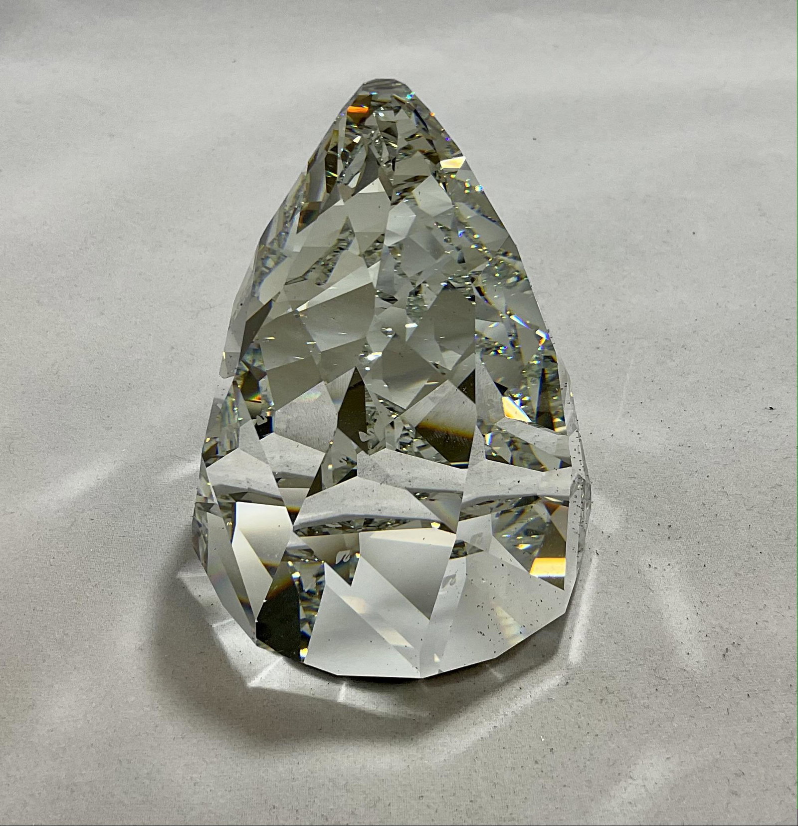 Swarovski Crystal Figurine Cone Paperweight Number 7452NR060095: Swarovski Crystal Figurine, Cone Paperweight, Number 7452NR060095, Unsigned, With Box, Note that the original packing material has been replaced, Condition very good, see photographs
