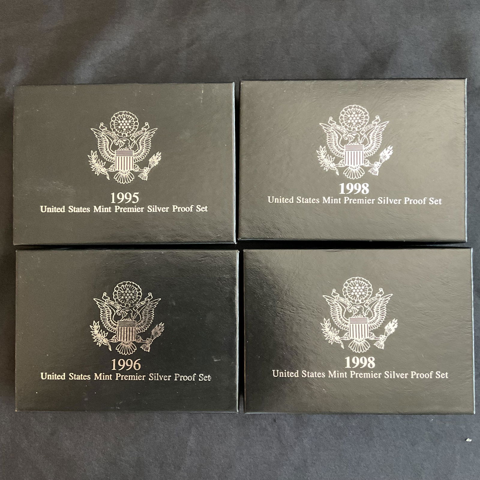 Group of 4 US Mint Premier Silver Proof Sets 1995, 1996, 1998, 1998 COA (1 of 5)