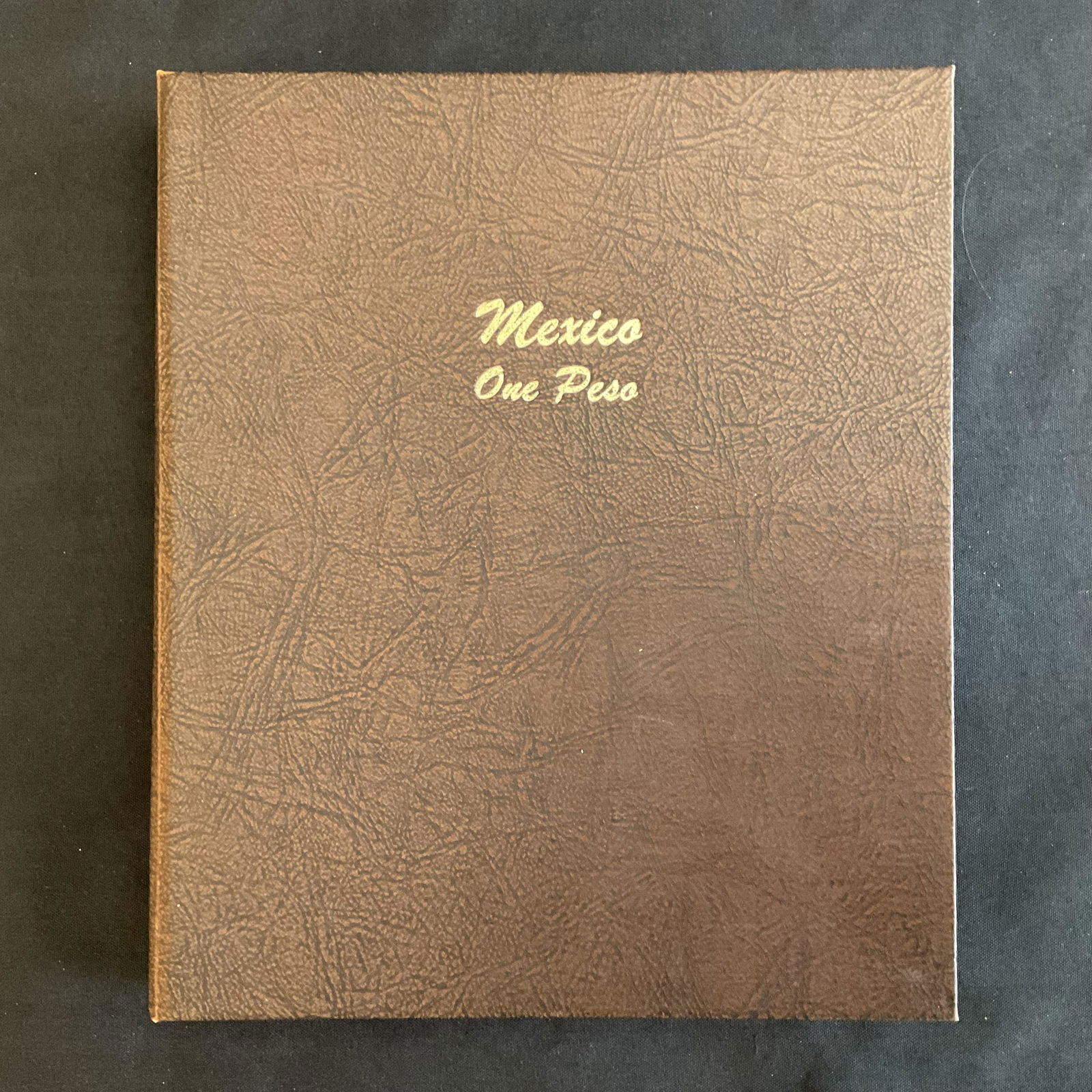 48 Mexico One Peso Coins of Mexico 1910 - 1968 in Dansco Binder No. 7226 (1 of 8)