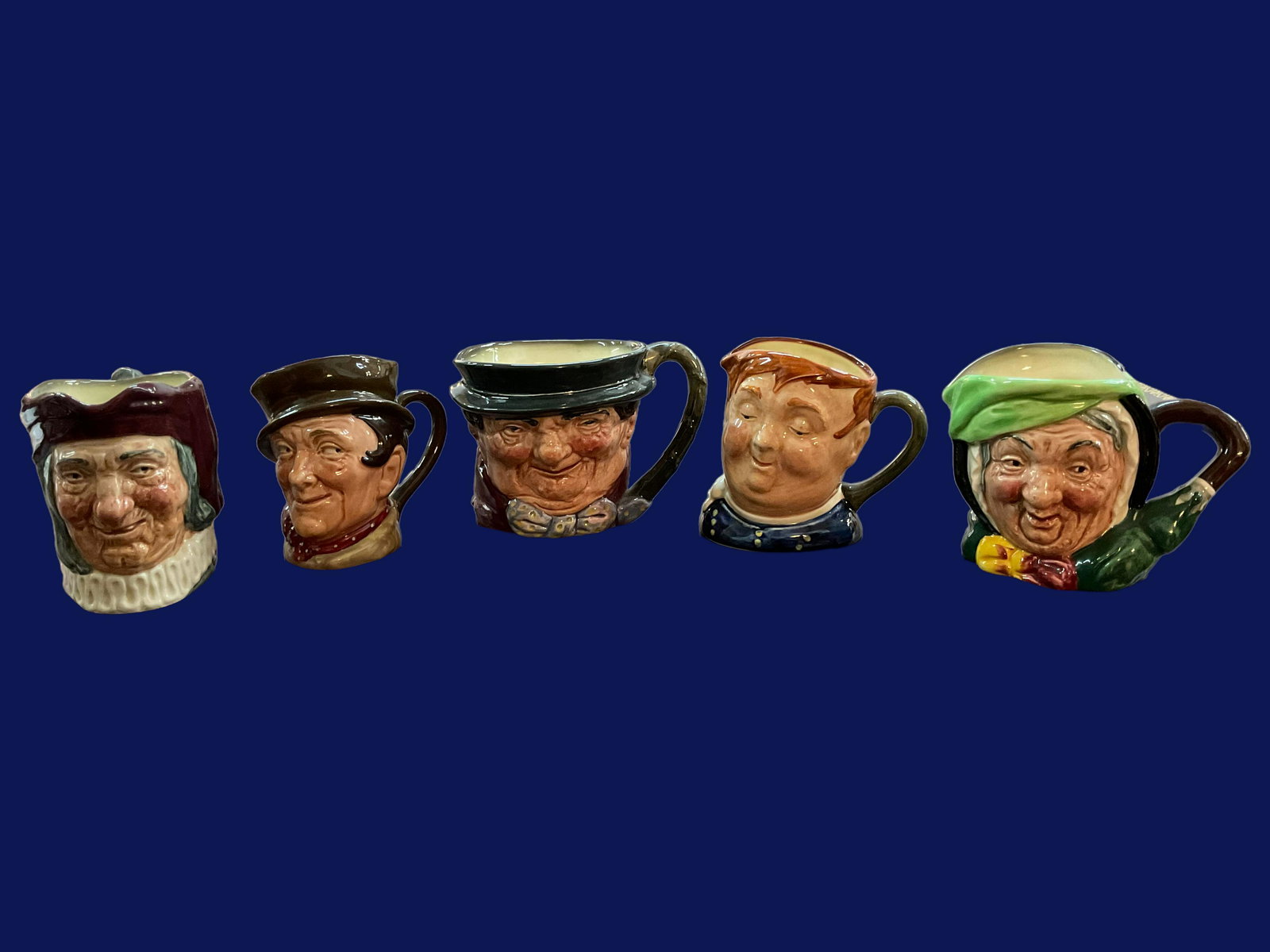 5 Royal Dalton Toby Jugs: 5 Royal Dalton Toby Jugs,All 5 jugs marked with letter A to left of the crown logo,The letter A was added to pieces C. 1939-1955,Tony Weller, 3" H, 2 3/4" W,Fat Boy, 3" H, 2 1/2" W