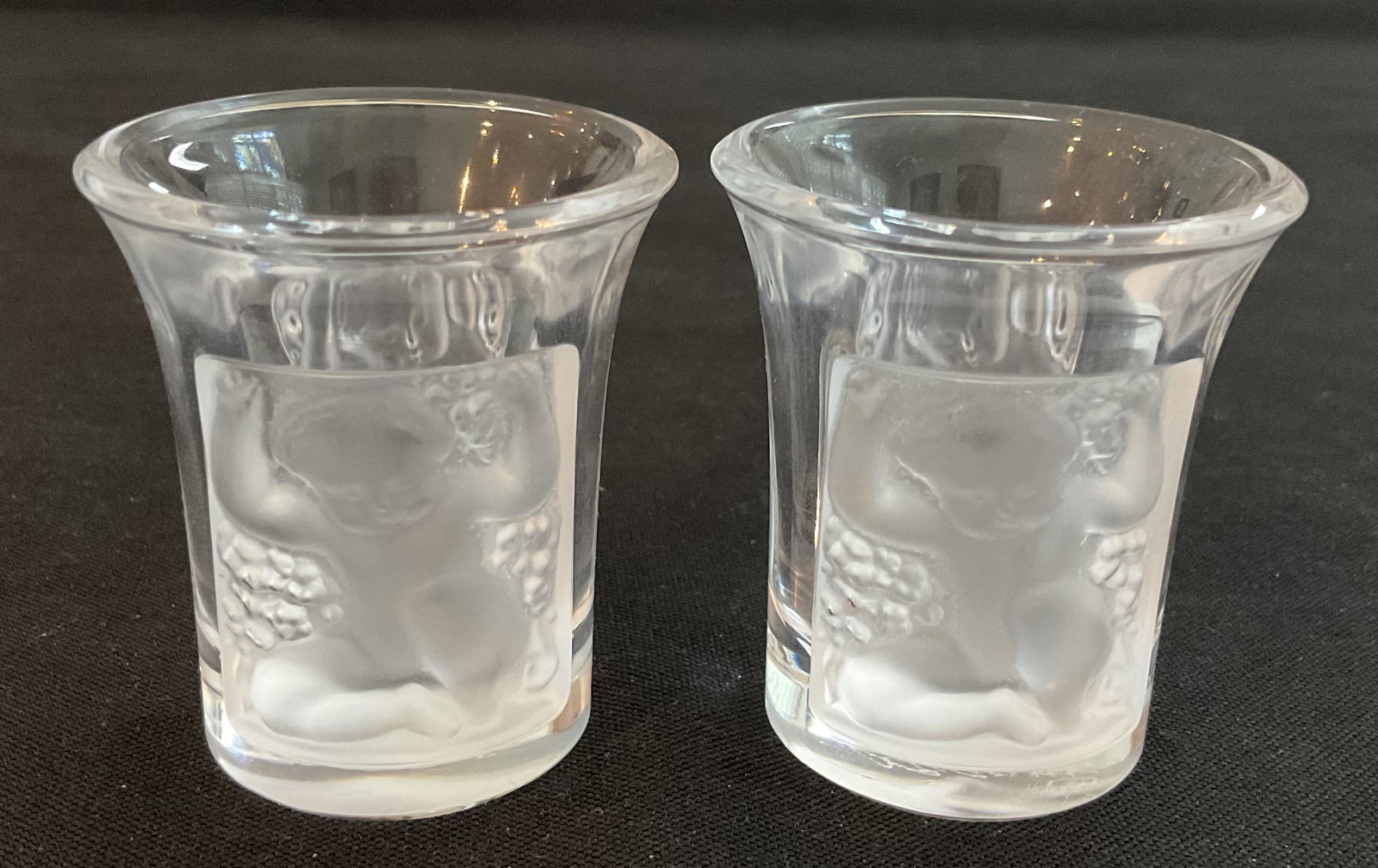 Pair French Lalique Shot Glasses: Pair French Lalique Shot Glasses, signed. Measures: 1 3/4" H x 1 1/2" W, Condition: Very Good, No Cracks or Chips, See Photographs.