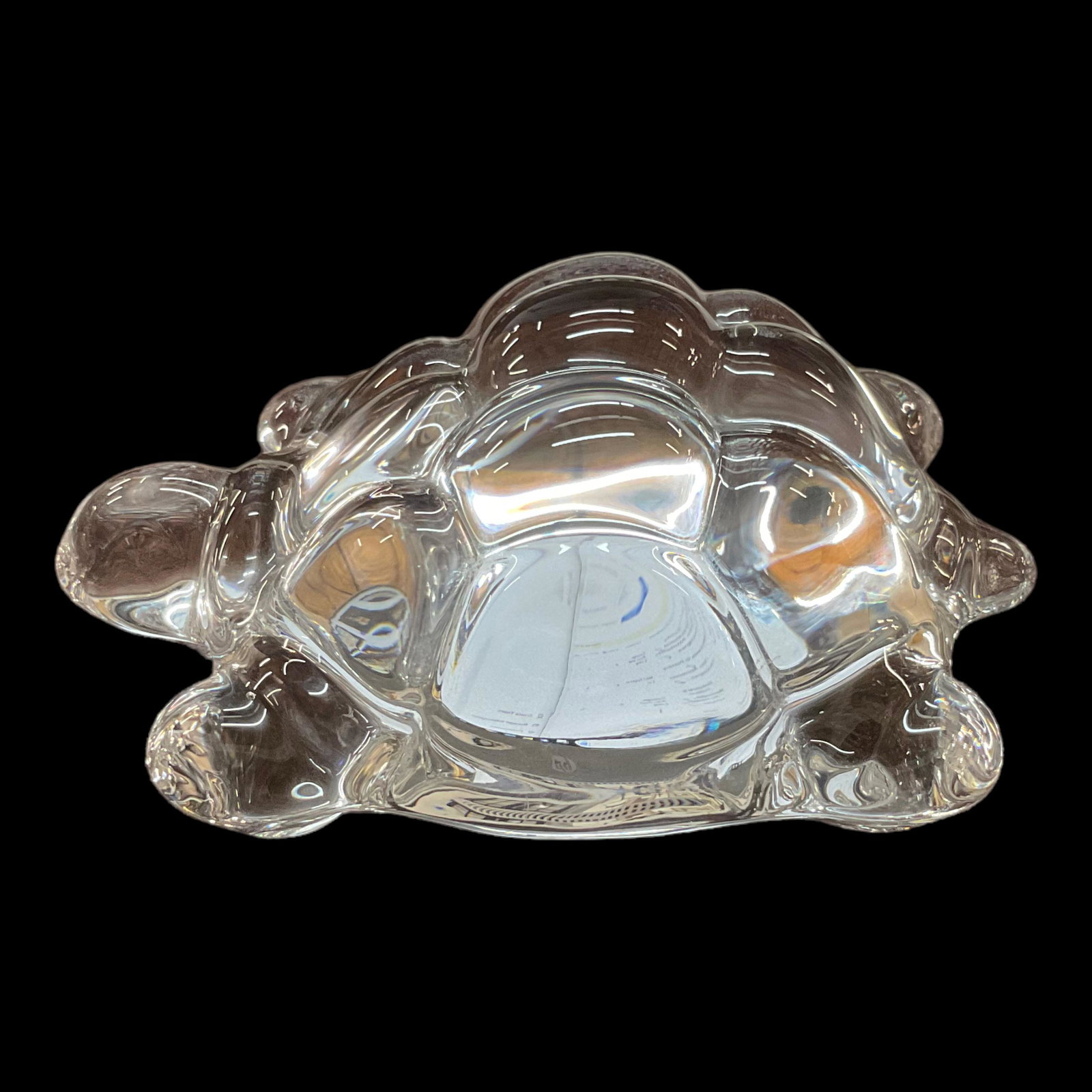 Daum Crystal Turtle Paperweight: Daum crystal clear turtle paperweight made in France. Signed on the bottom of the paperweight. It measures approximately 3.5" long and 2.75" wide. The paperweight is in good condition