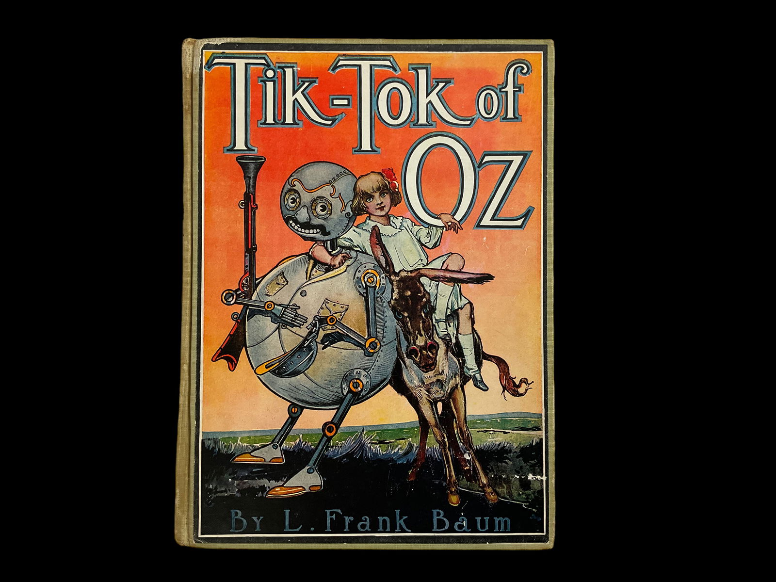 Tik-Tok of Oz By L. Frank Baum, 1914: Tik-Tok of Oz By L. Frank Baum, 1914, Published by The Reilly & Lee Co. Chicago, Illustrated by John R. Neill, No Dust Jacket, Green Cloth Cover, 272 pp. Has previous owners name plate on inside c