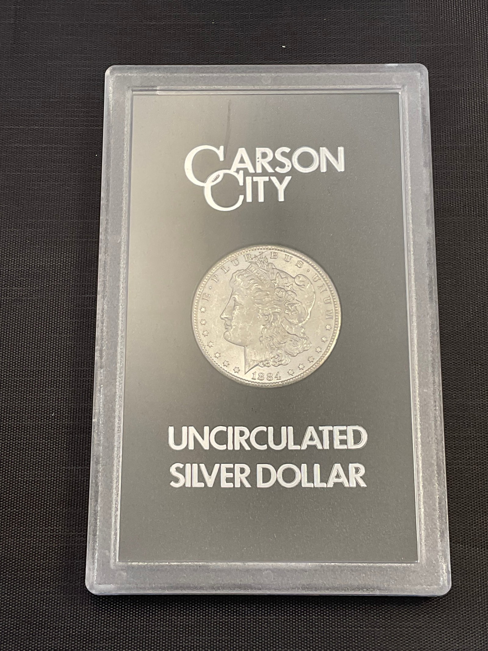 1884 CC Uncirculated Morgan Silver Dollar in Display Case with original box and COA, (1 of 8)