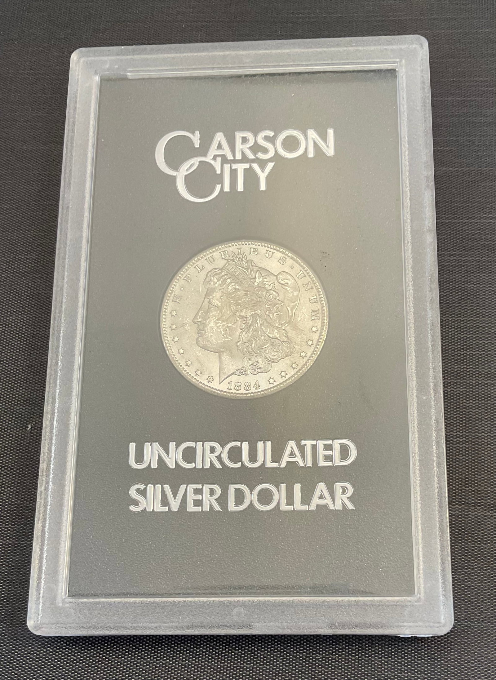 1884 CC Uncirculated Morgan Silver Dollar in Display Case with original box and COA (1 of 9)