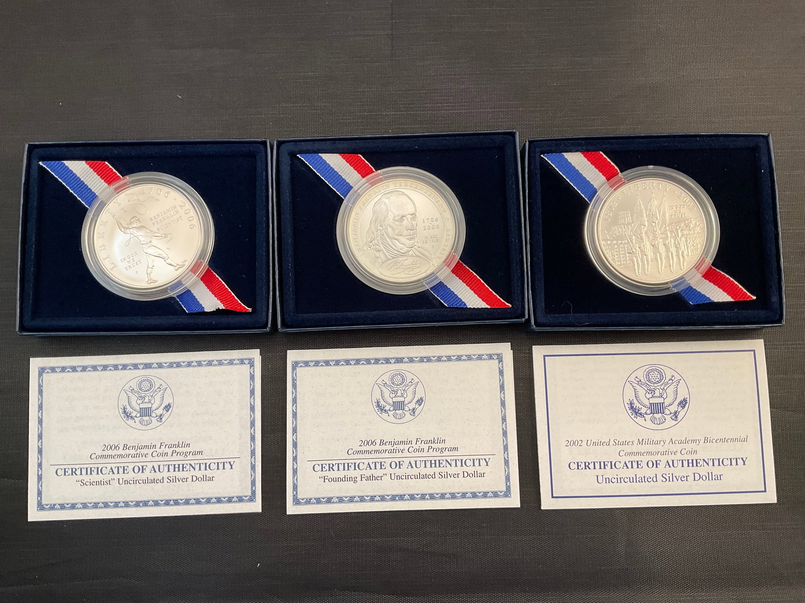 Group of Three US Mint Uncirculated Commemorative 0.900 Silver Dollars (1 of 15)