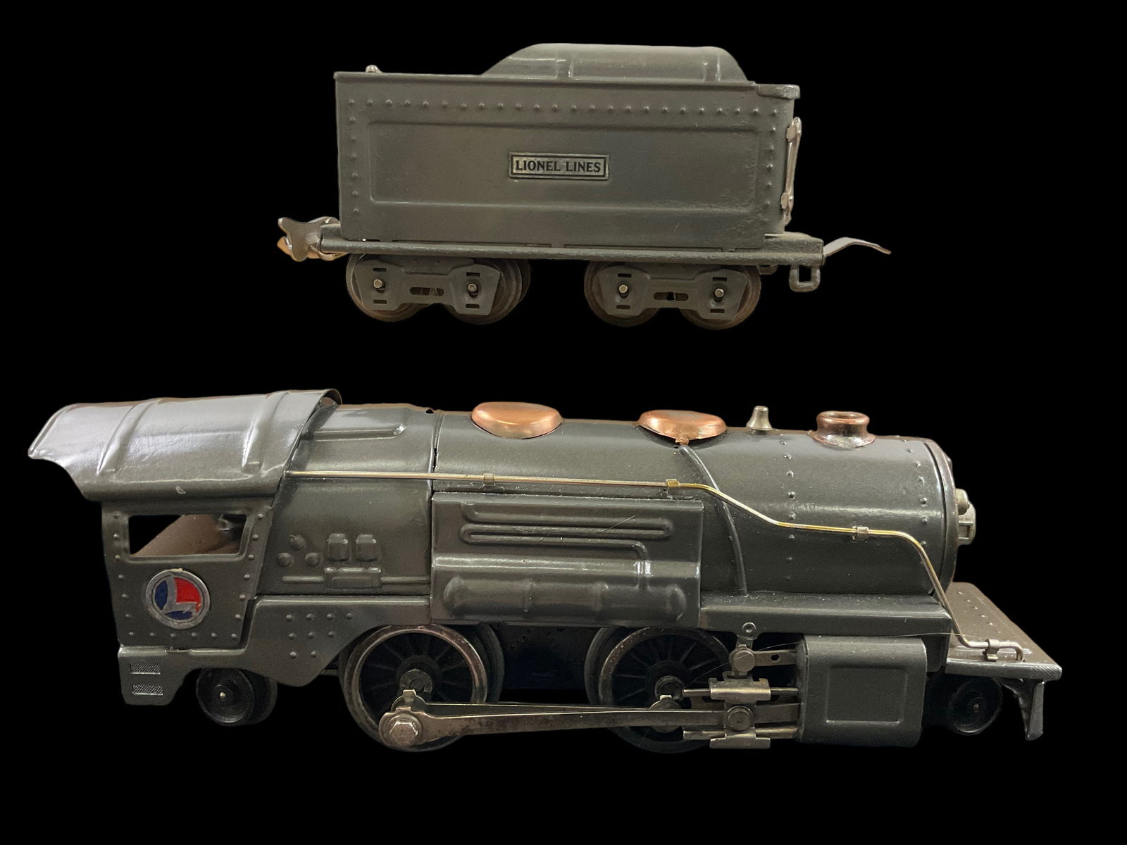 Lionel Prewar O Gauge 259E Steam Locomotive with 8-Wheel Tender: Lionel Prewar 2-4-2. O Gauge 259E Steam Locomotive Black, 9" 8-Wheel Tender, Black, with Refinished Tinplate Sticker, 5.5" Condition, see photographs.