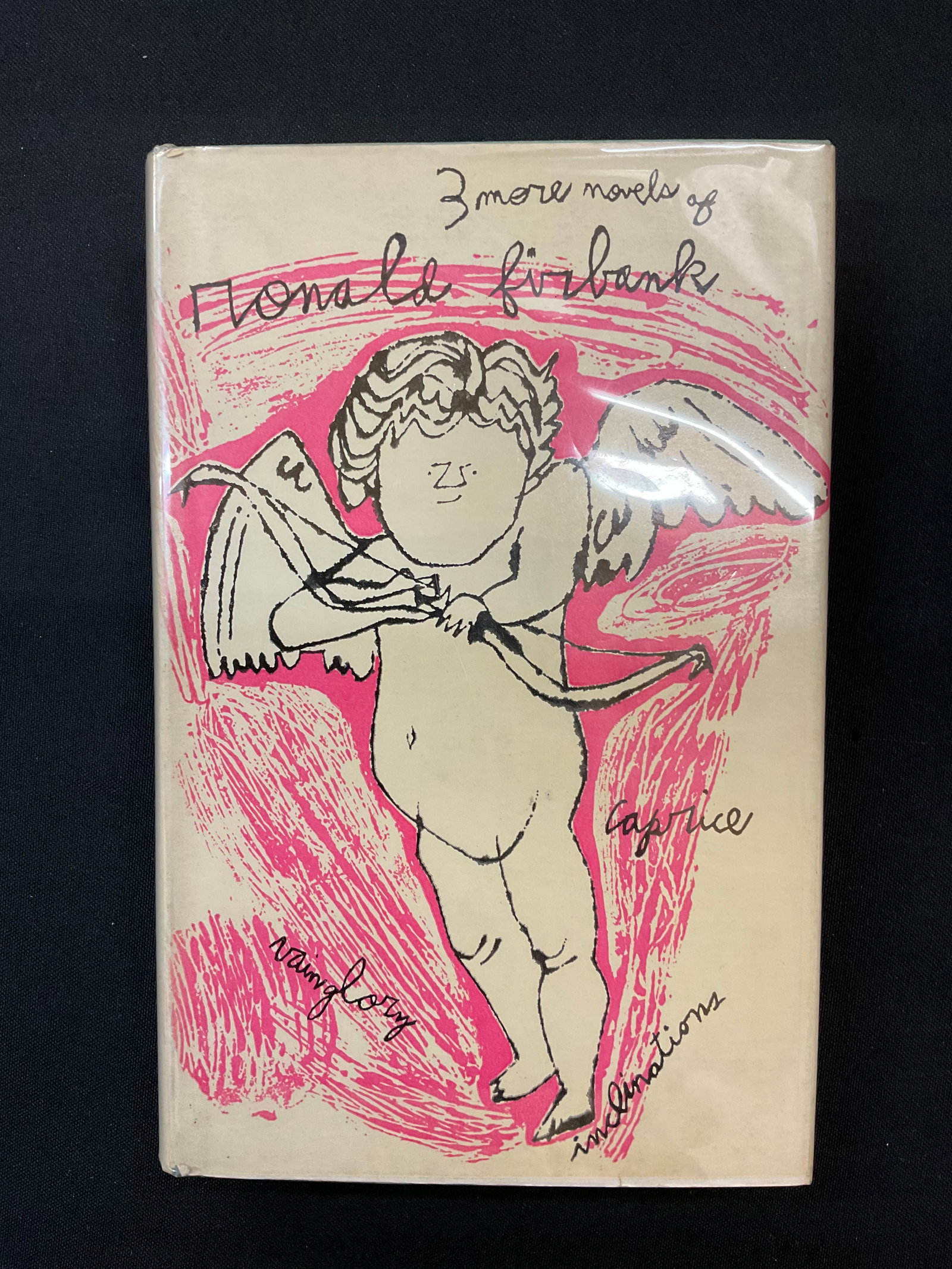 Three More Novels of Ronald Firbank, First Printing: Three More Novels of Ronald Firbank, First Printing New Directions Book, No Date Vainglory, Inclination, Caprice, with an introduction by Ernest Jones, Dust Jacket and Mylar Cover Condition previous o