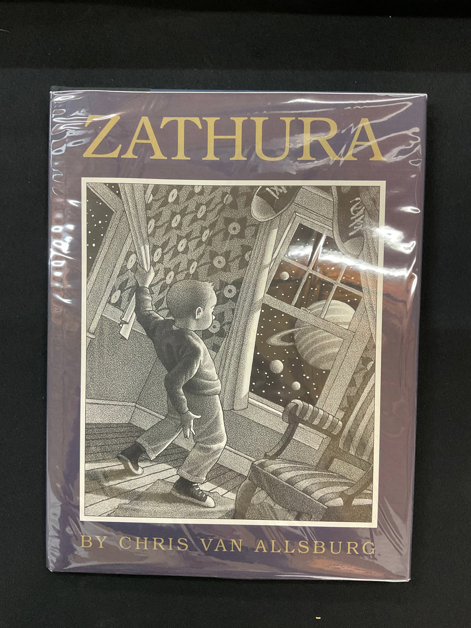 Zathura by Chris Van Allsburg 1st Edition 2002: Zathura by Chris Van Allsburg 1st Edition 2002 Houghton Mifflin Company, Illustrated by Author, ISBN: 0618253963, Numbered 1st Edition Dust Jacket Condition book bumped corners, faded, DJ bumped corne