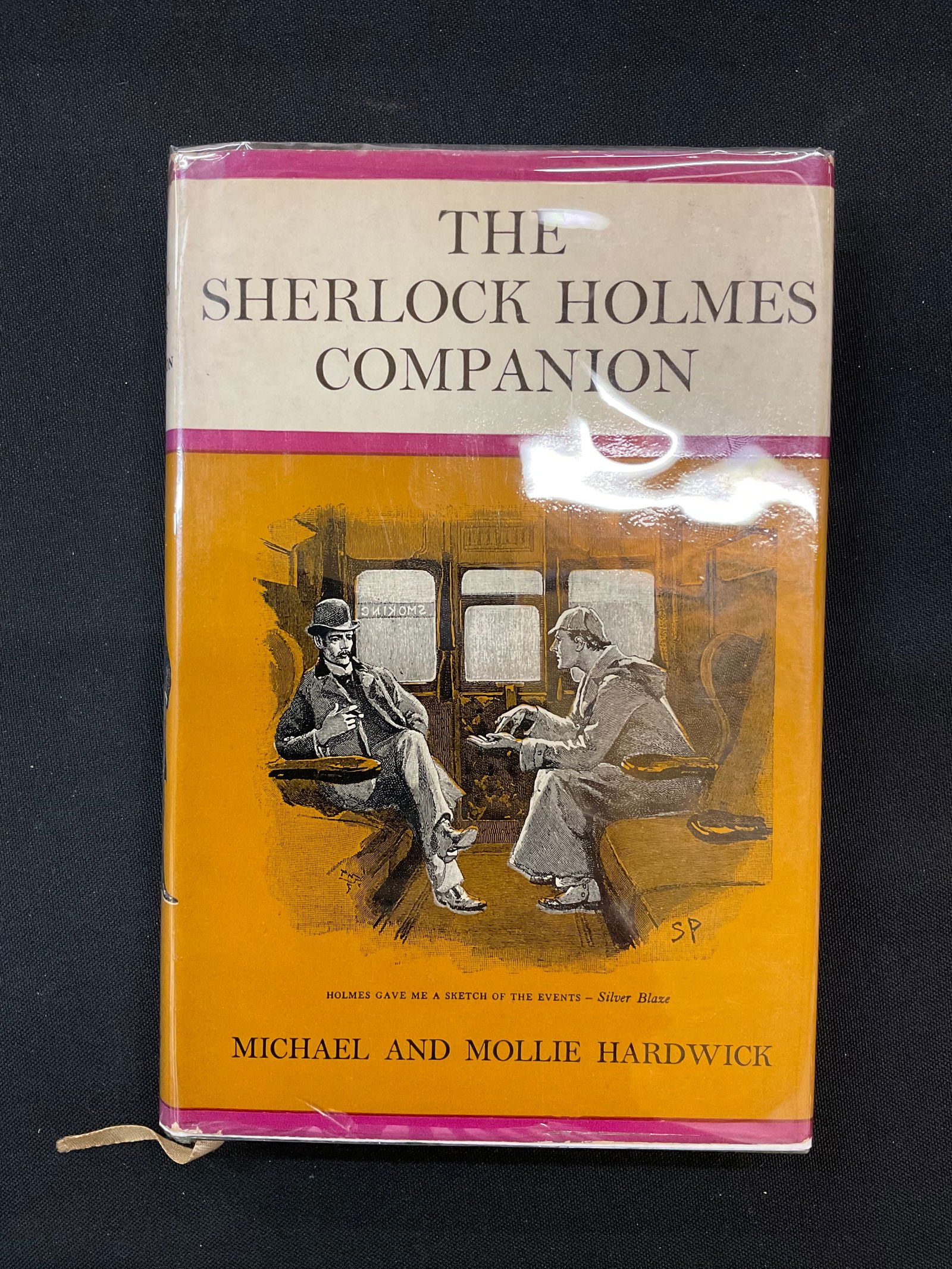 The Sherlock Holmes Companion by Michael and Mollie Hardwick 1962: The Sherlock Holmes Companion by Michael and Mollie Hardwick 1962 Illustrations by Sidney Paget, John Murray London Dust Jacket with 21s net price and Mylar Cover Condition foxing around edges, DJ sma