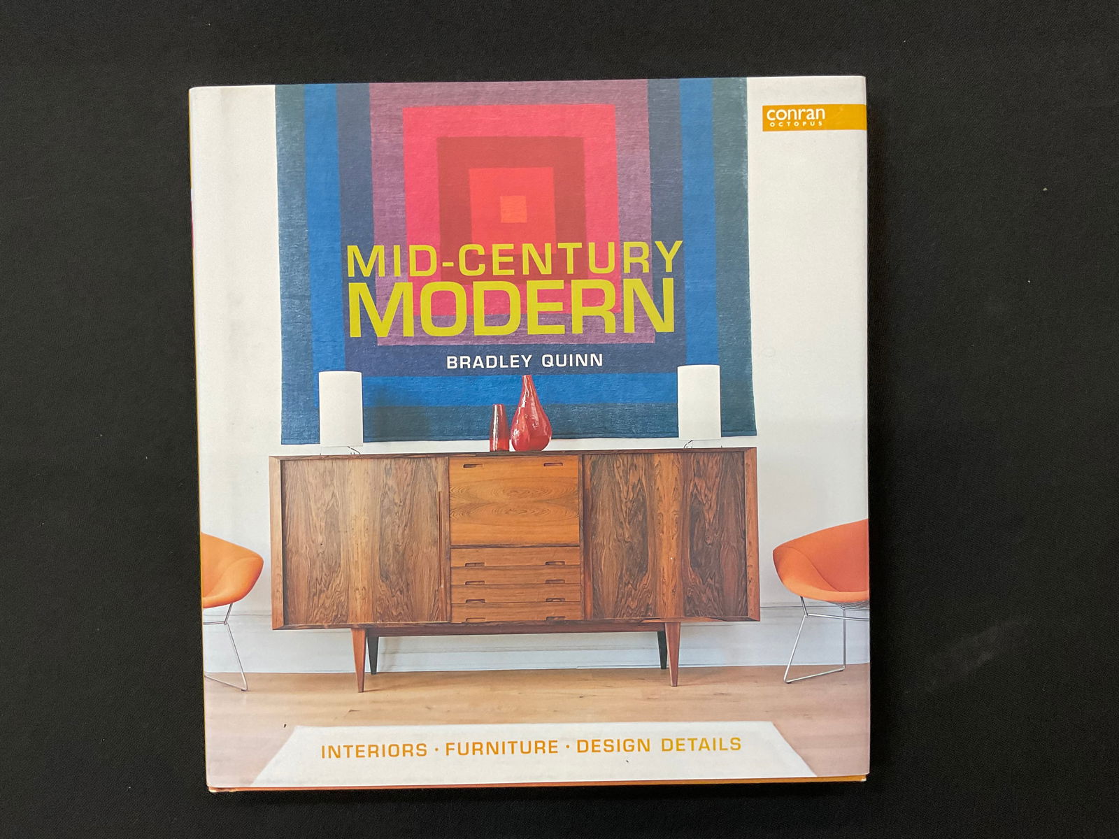 Mid-Century Modern by Bradley Quinn 2011: Mid-Century Modern by Bradley Quinn 2011 Interiors, Furniture, Design Details, Conran Octopus Limited, ISBN: 9781840914061 Dust Jacket Condition bumped corners, faded on bottom of book, see photo