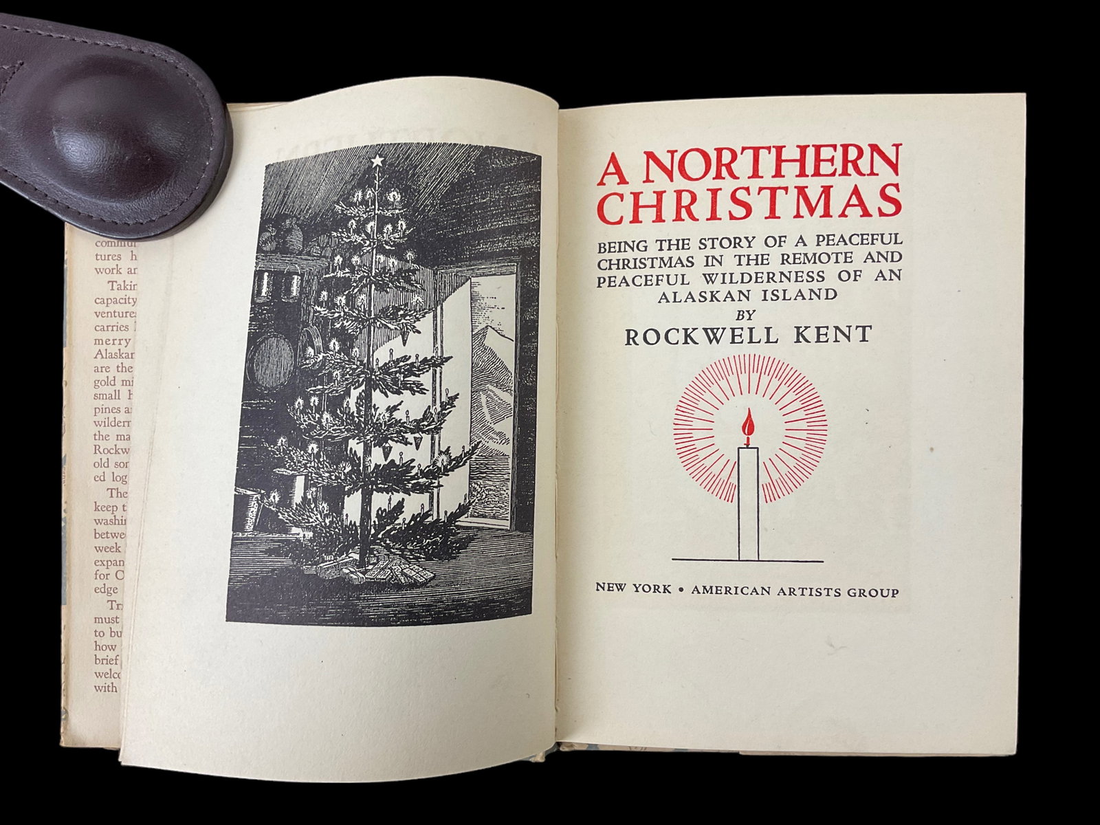 A Northern Christmas, 1941 by Rockwell Kent: A Northern Christmas, 1941, by Rockwell Kent, Publisher American Artists Group New York, with illustrated boards, Dust Jacket, writing on 1st page, DJ torn, foxing, bumped corners, spine intact, Dust 