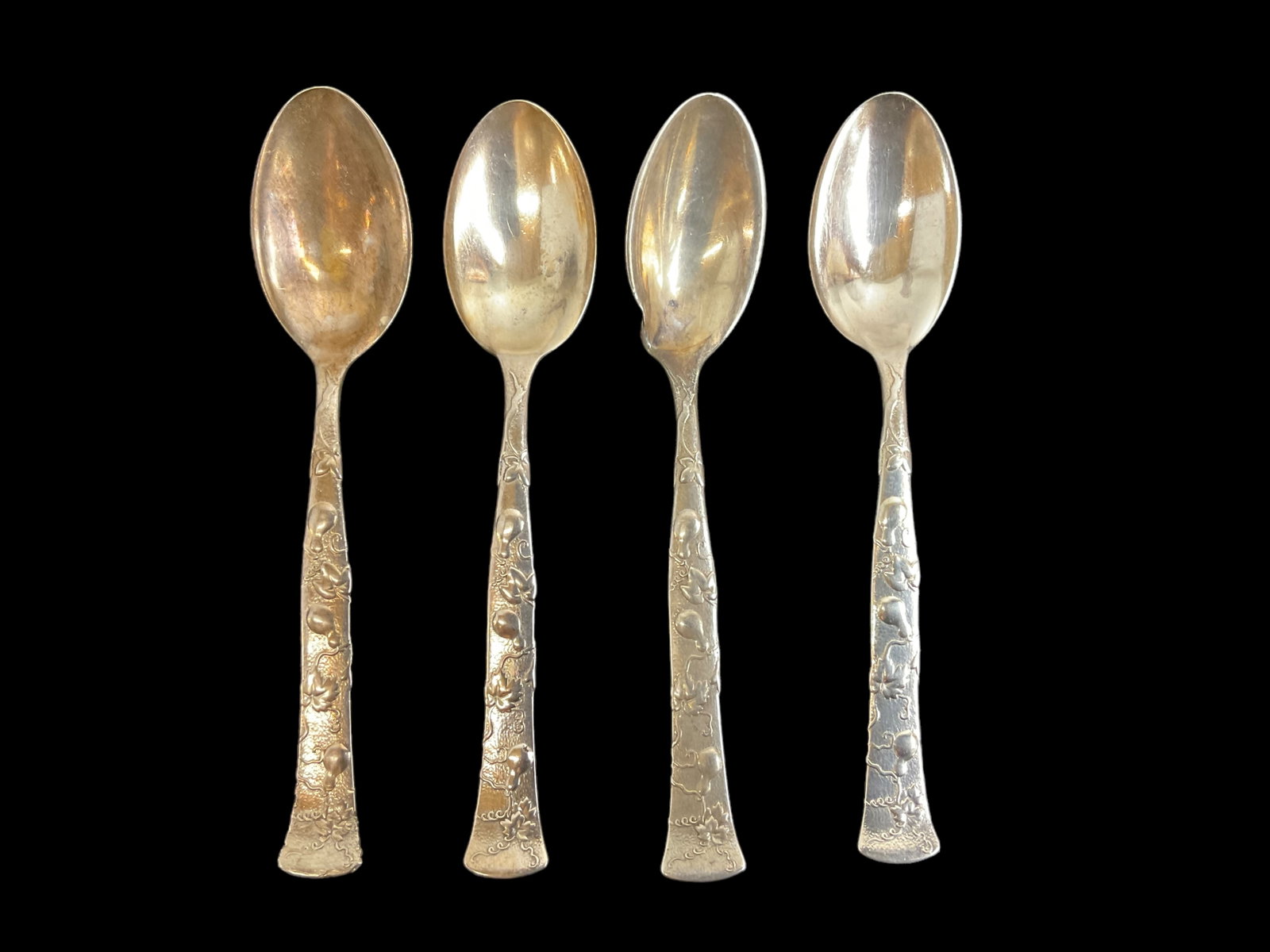 Group of 4 Tiffany & Co. Vine Motif Sterling Silver Orange Spoons circa 1872: Group of 4 Tiffany & Co. Vine Motif Sterling Silver Orange Spoons circa 1872, weighs 91 g, Condition, one spoon is bent, one spoon is pitted, see photographs.