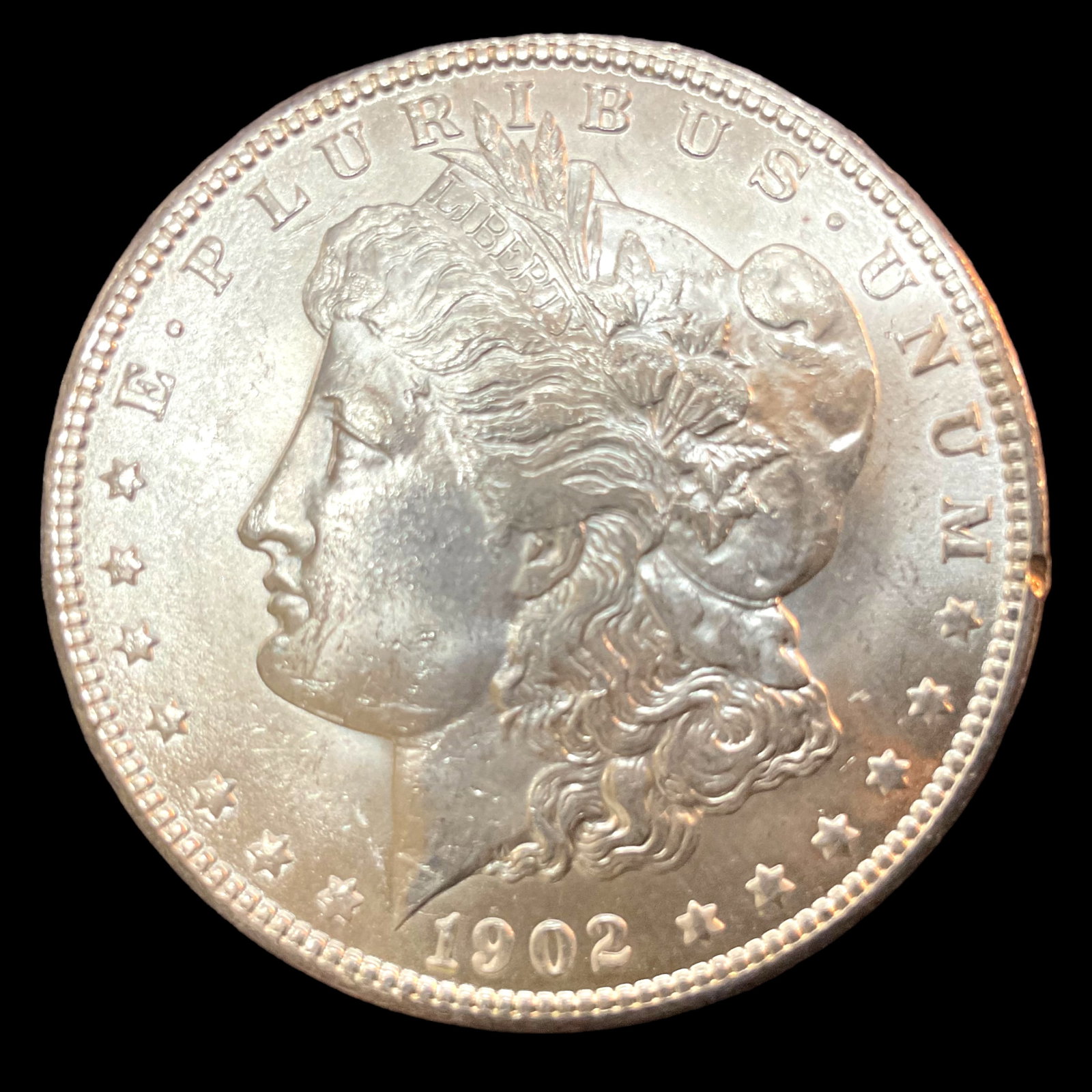 1902 O Morgan Silver Dollar: 1902 O Morgan Silver Dollar, 0.900 Silver, net weight .77344 ozt pure silver, Condition, see photographs.