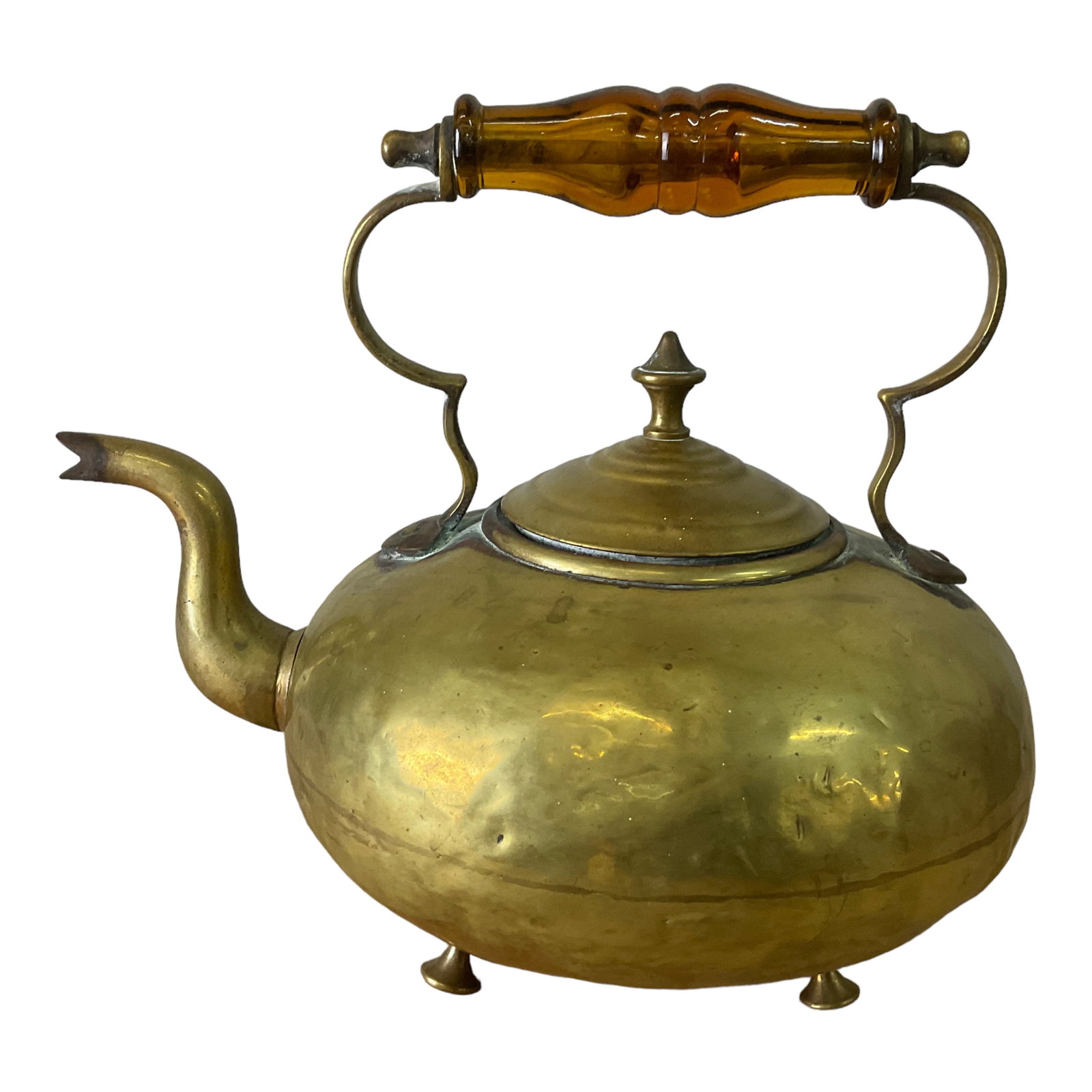 Brass Kettle With Amber Glass Handle: Brass kettle with amber glass handle marked on the bottom JCB Best Hammered. The kettle is 8.5" tall and 9.5 " at its widest point. Condition, kettle is dented and corroded in several p