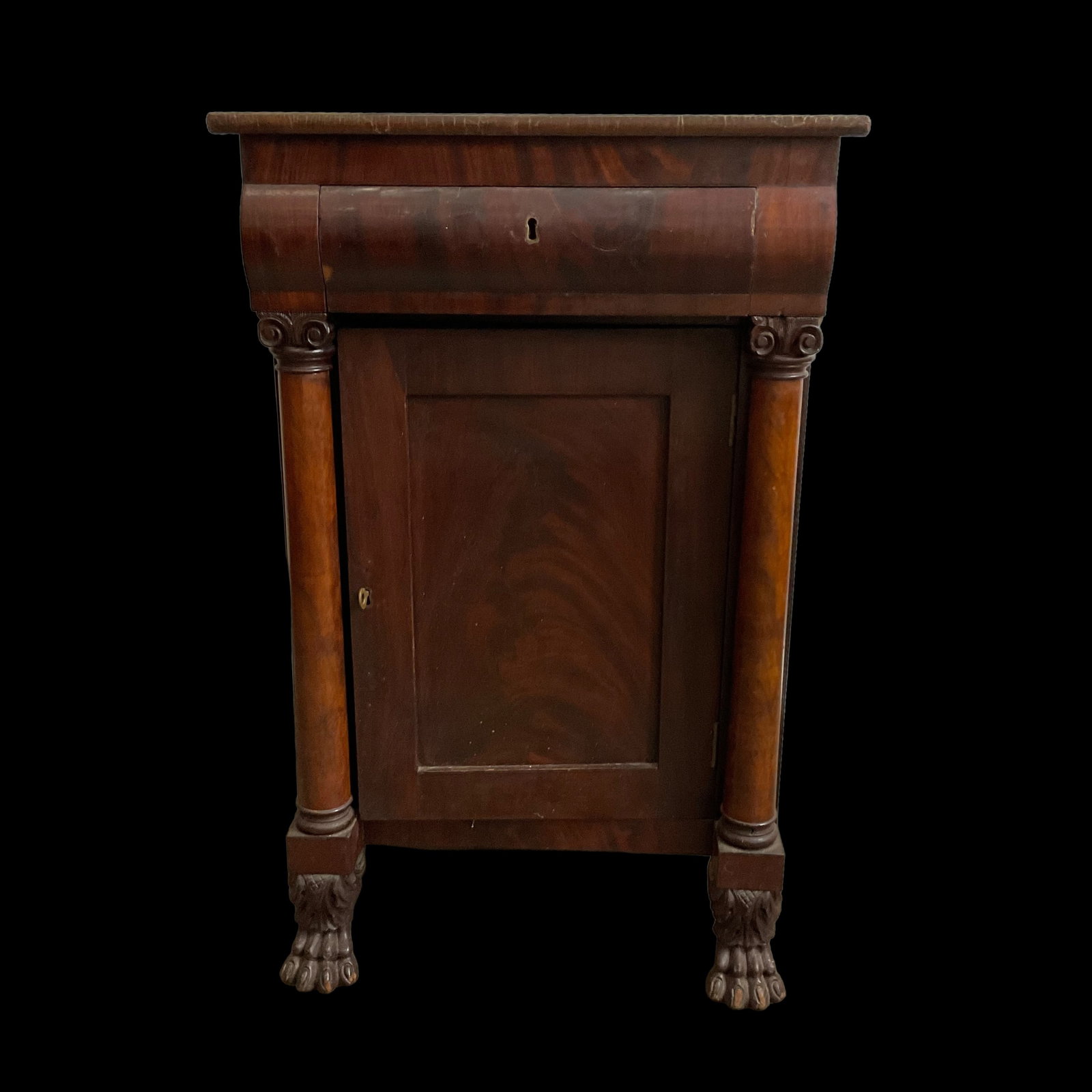 Victorian Mahogany Claw Footed Nightstand with Drawer and Cabinet: Victorian Mahogany Claw Footed Nightstand with Drawer and Cabinet. measures 19" W x 30" H x 15 1/2" D, Condition, top coating is very cracked and the key is missing, see photographs. From the private 