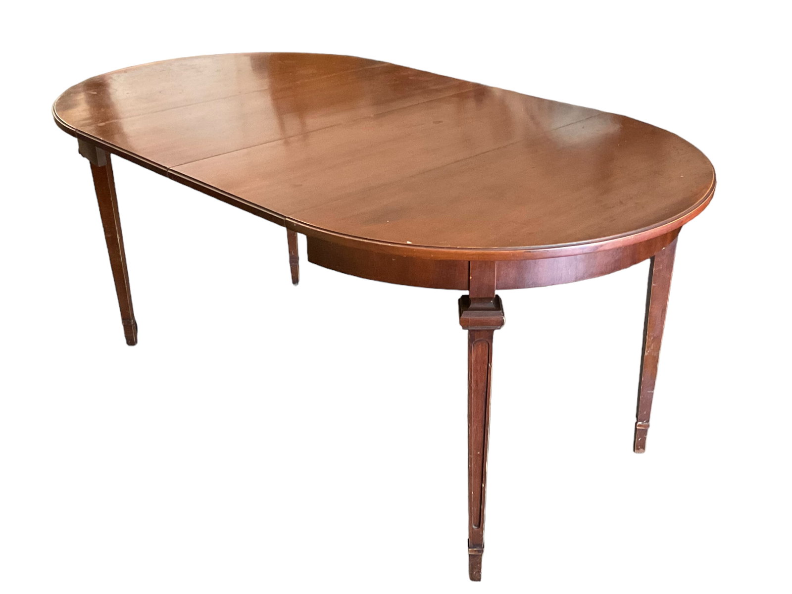 Round Dining Table with 2 Leaves: Round Dining Table with 2 Leaves. The table when closed is a 60” round and can be expanded with two additional leaves. Measures: Condition, Table has scratches and the finish is worn in pl